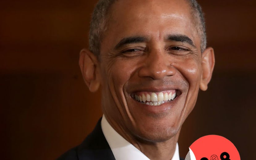 President Barack Obama smiling in a suit