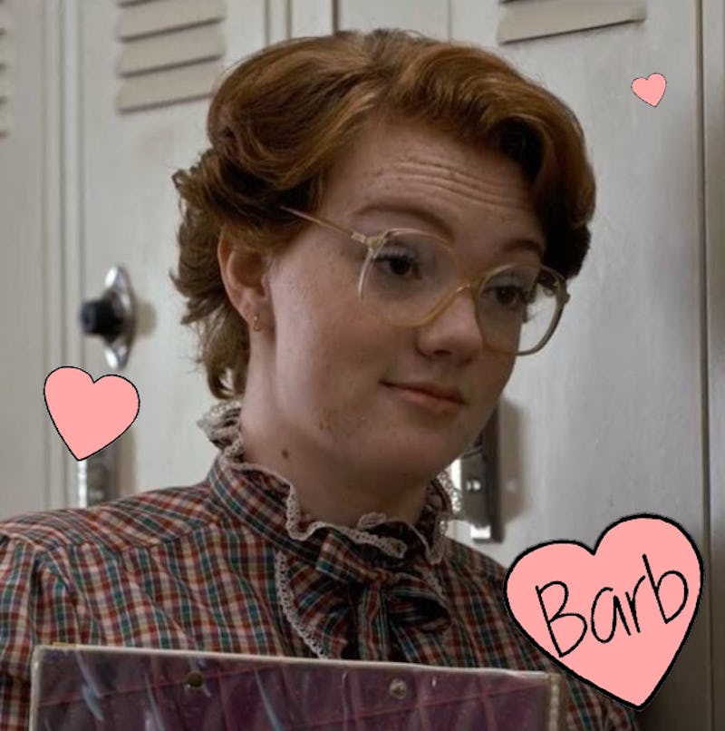 Shannon Purser as Barb standing next to the school's locker while talking to another person in the S...