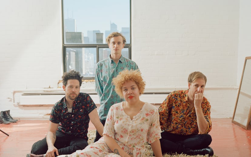 The Weaves members posing on a rug