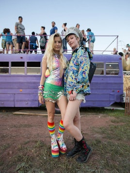 Two girls posing in colorful outfits