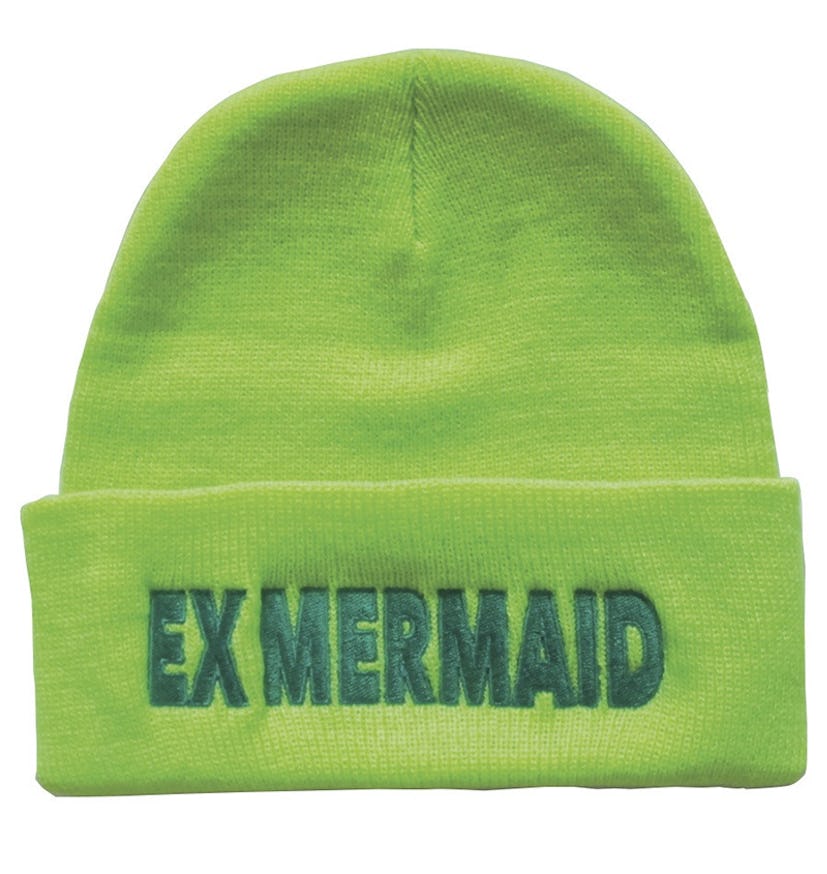 Green beanie with EX MERMAID text on it