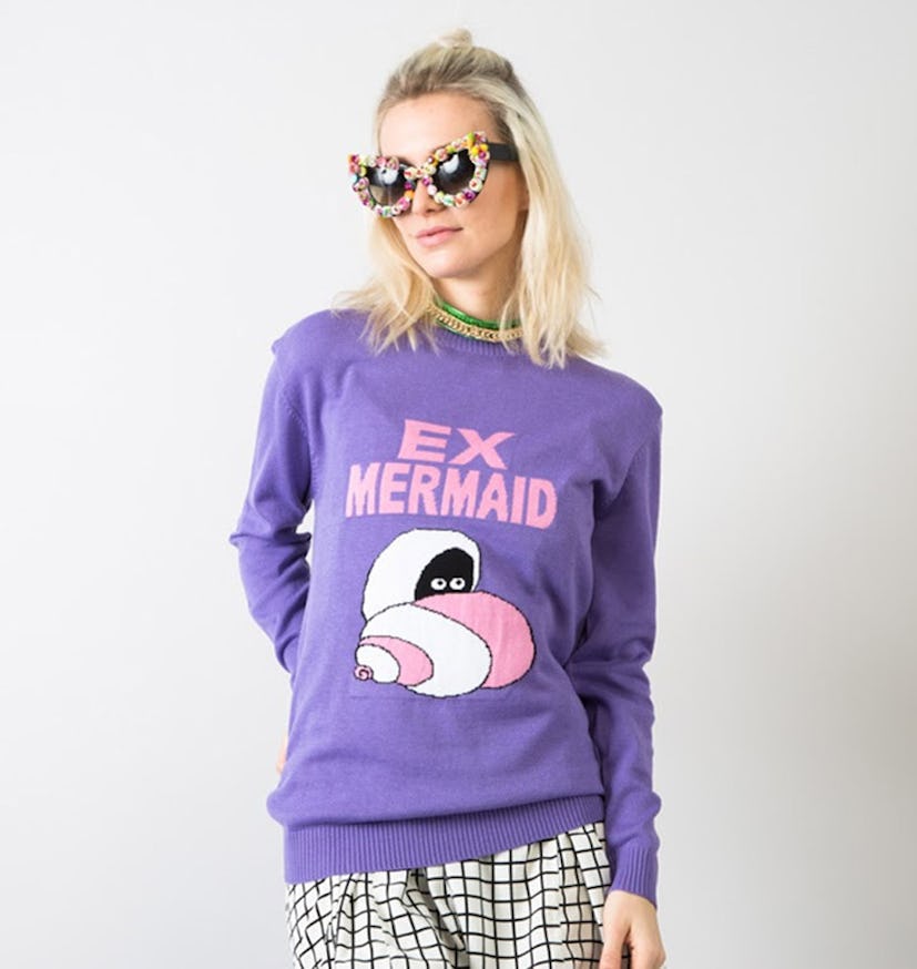 Purple knit sweater with the text "Ex Mermaid" 