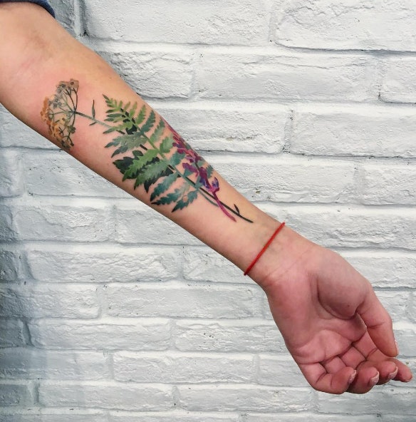 Green leaf tattoo for spring  leaftattoo ladytattoo colortattoo  tattooideas  Single line tattoo Tattoos Dream tattoos