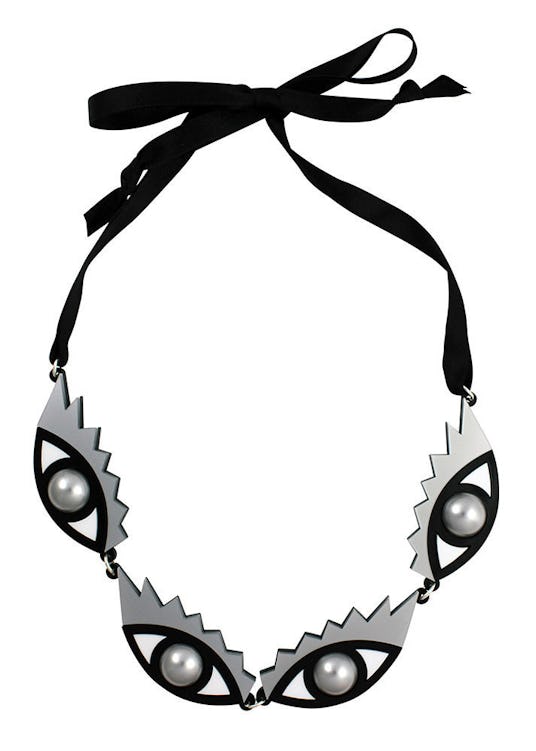 Necklace with 4 silver-black eyes on a black lace