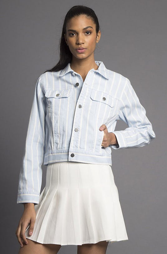 A blue and white Venice Striped Denim Jacket, that is a part of  Missy Skins’ Lovesick collection wo...