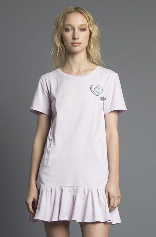 Baby Girl Tee Dress, a short shirt-dress from Missy Skins’ Lovesick collection worn by a female mode...