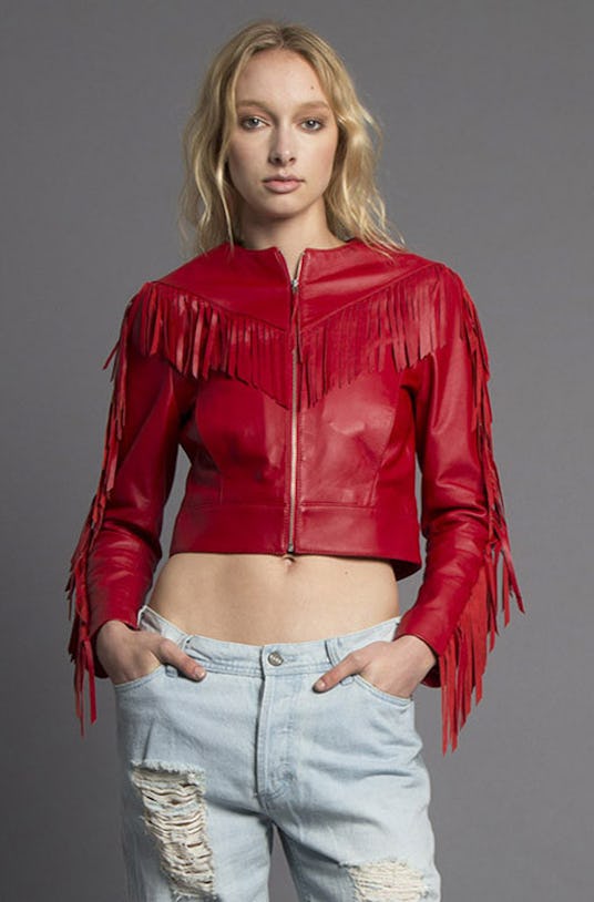 A model posing in a Till The End Red Fringed Leather Jacket from Missy Skins’ Lovesick collection