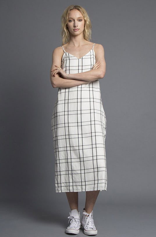 A blonde woman is wearing a Monochrome checked Queenie Dress from Nana Judy’s Spring 2016 Collection