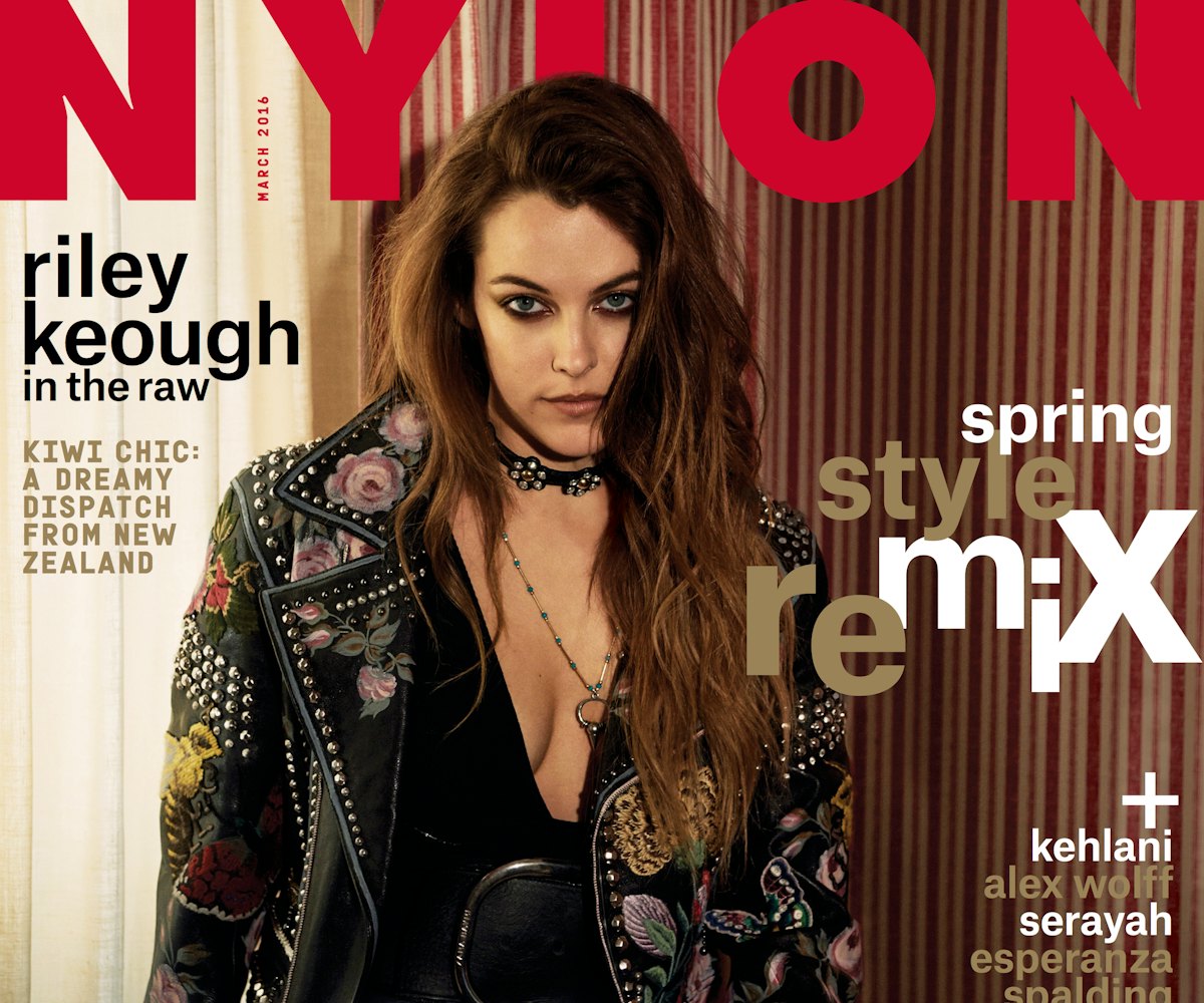 Riley Keough on a cover of a magazine in a bedazzled leather jacket by Gucci and black eye make-up