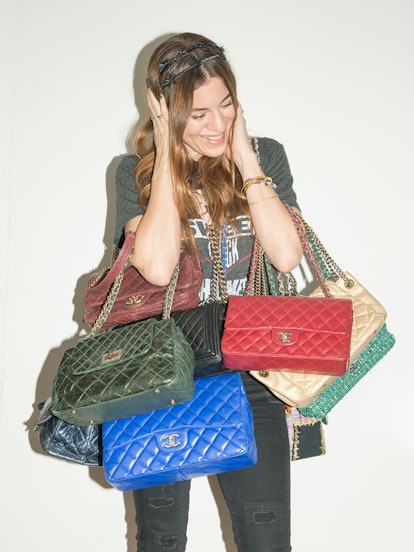 Dani Stahl posing while holding 10 totes