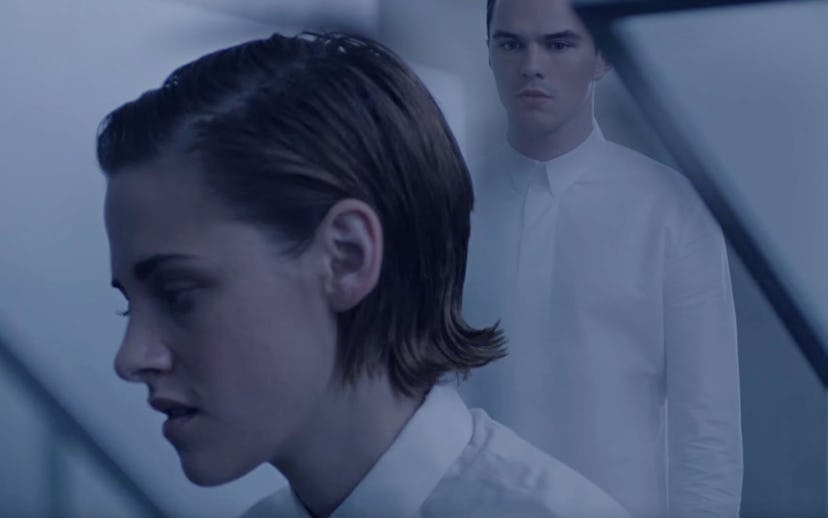 Nicholas Hoult looking at Kristen Stewart in the new "Equals" movie