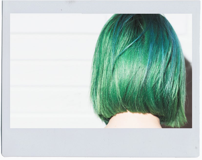 Green hairstyle of a young woman