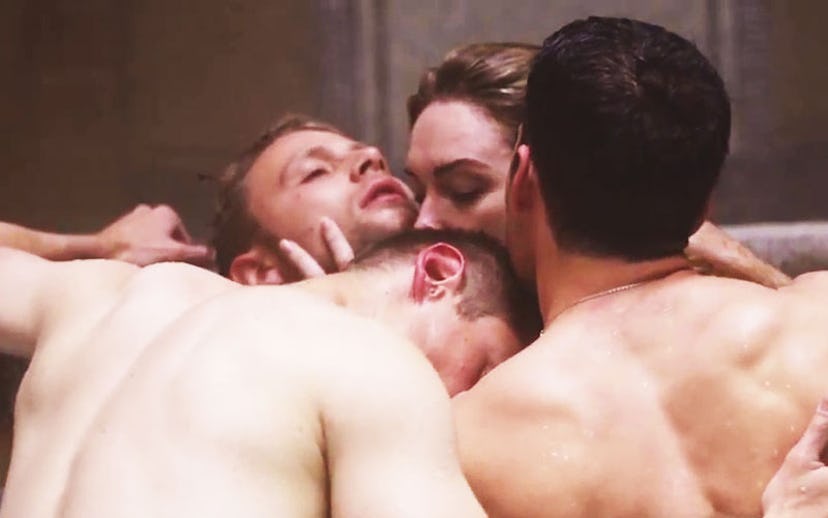 A sex scene featuring a woman with three men
