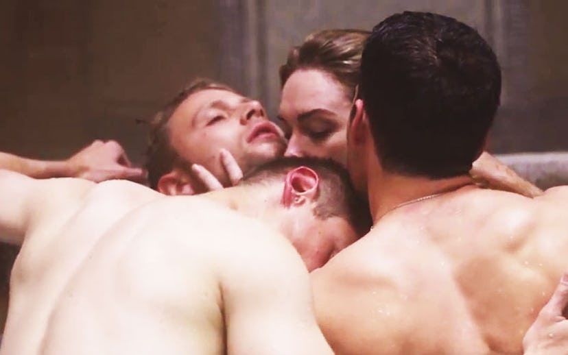A sex scene featuring a woman with three men 