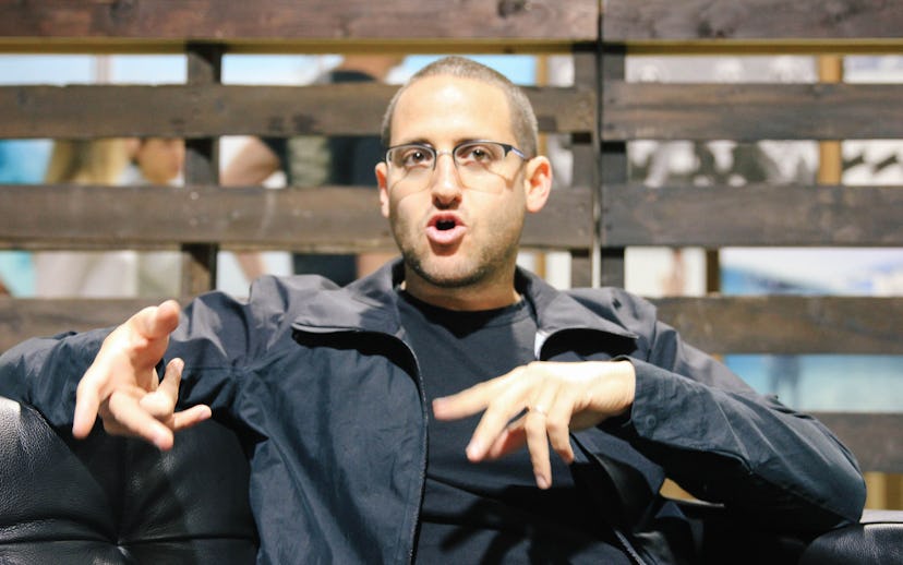 Aaron Levant speaking and waving his hands