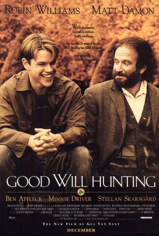Robin Williams and Matt Damon laughing on the cover of Good Will Hunting