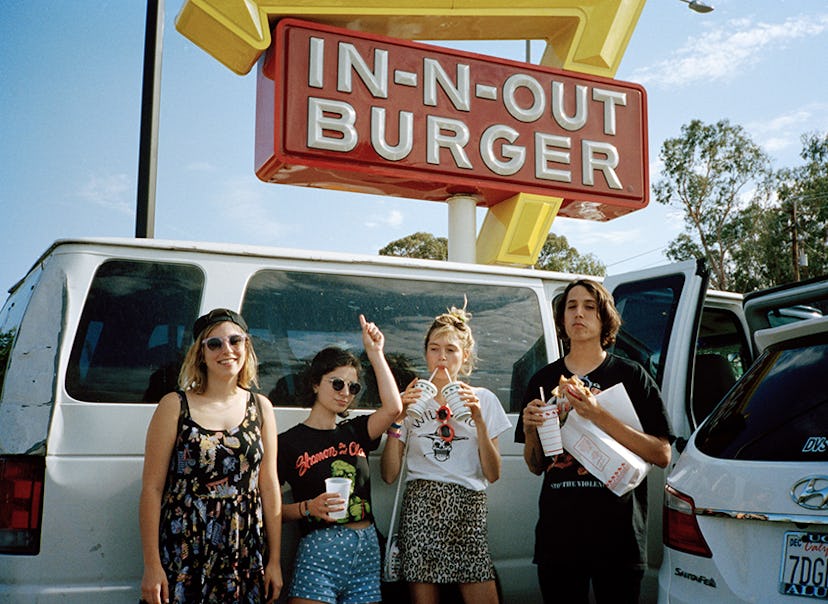 The Paranoids posing in front of In-N-Out