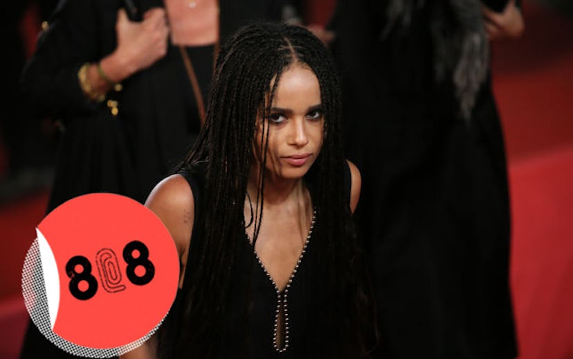 Zoë Kravitz with braids wearing a black top