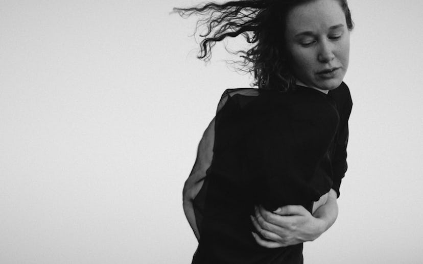 Sarah Winters, Vox, wearing a black dress on the photo shooting