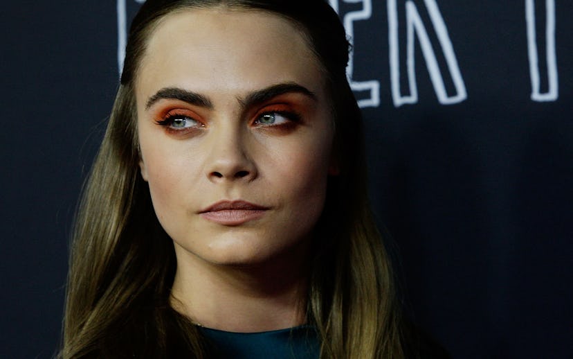 Cara Delevingne having red eyeshadow on the red carpet