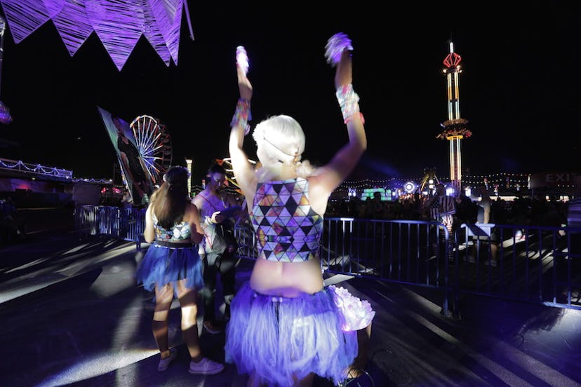 Female dancers dancing at the stage of the Electric Daisy Carnival