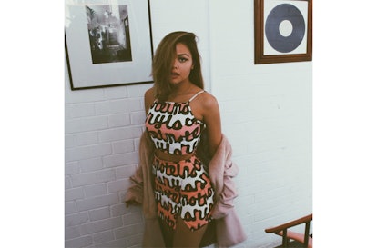 Liza Owen in the NYLON x Motel Rocks abstract crop top and cut-out skirt two-piece 