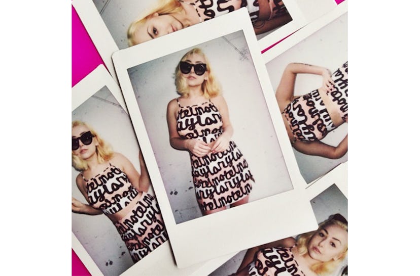Polaroids of Nicole in the NYLON x Motel Rocks abstract crop top and cut-out skirt two-piece