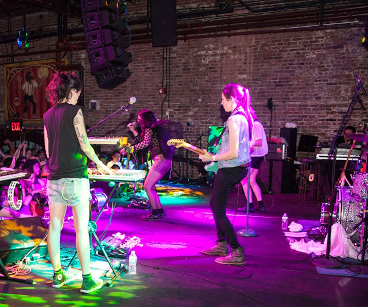 Artists performing in front of a crowd at the Nylon music tour