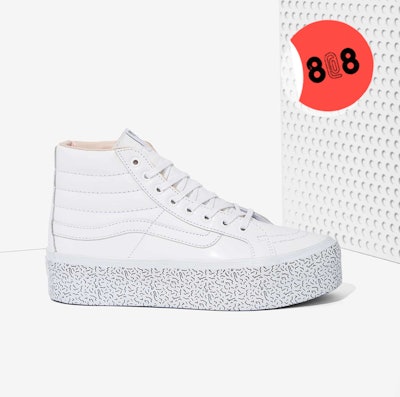 White Nasty Gal x VANS collaboration shoes with a white background