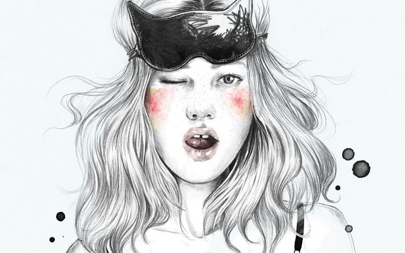 A girl with rose cheeks and a sleeping mask on her head