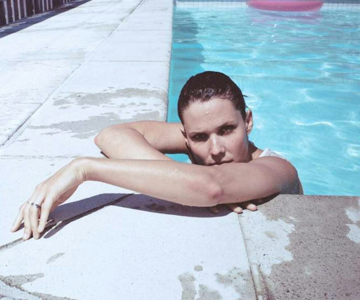 Nanna Øland Fabricius resting in a pool