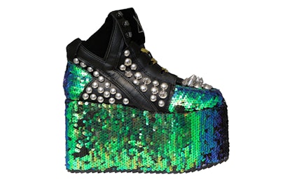 The Qozmo Dragon shoe with a green and blue sequin platform and studs 
