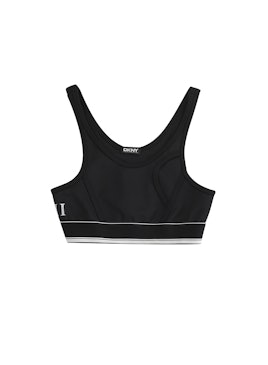 Black sports bra with a white line from the Cara Delevingne's  DKNY capsule collection