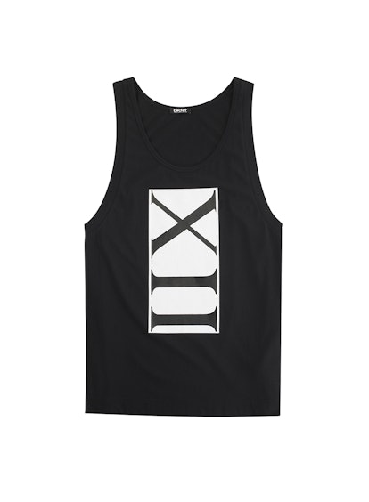 Black sleeveless shirt with a white box containing roman 12 in it from the Cara Delevingne's DKNY ca...