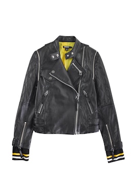 Black exterior and yellow interior leather jacket from the Cara Delevingne's DKNY capsule collection