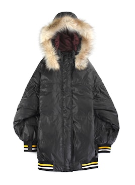 Winter coat with a furred hood from the Cara Delevingne's DKNY capsule collection