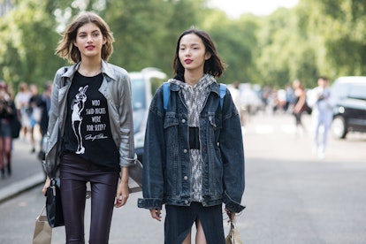 Valery Kaufman in a black shirt, grey button up and black leggings and Xiao Wen Ju in a denim coat a...
