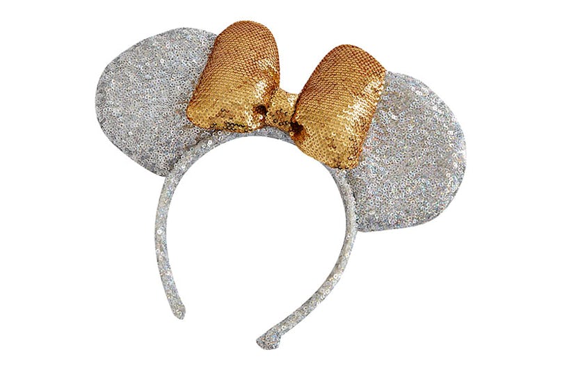 A shimmery silver Minnie Mouse headband with a golden shimmery bow from ASOS' new collaboration with...
