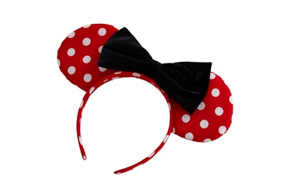 A red polka-dot Minnie Mouse headband with a black bow from ASOS' new collaboration with Disney