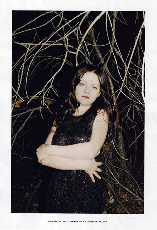 Meg White posing in a black dress from Spring/Summer 2006 Marc Jacobs collection