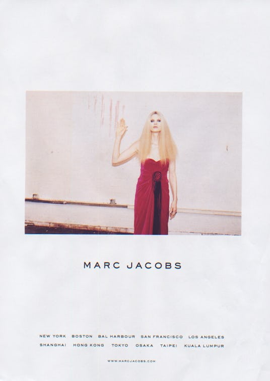 Young blonde female model wearing a red dress from the 2005 Fall/Winter Marc Jacobs collection