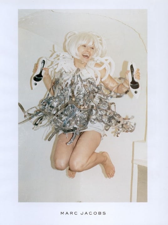 Samantha Moreton jumping in the air while wearing a dress from the Marc Jacobs collection in 2003