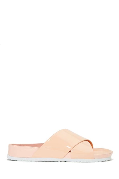 Jeffrey Campbell slide sandals in light pink with a white sole 