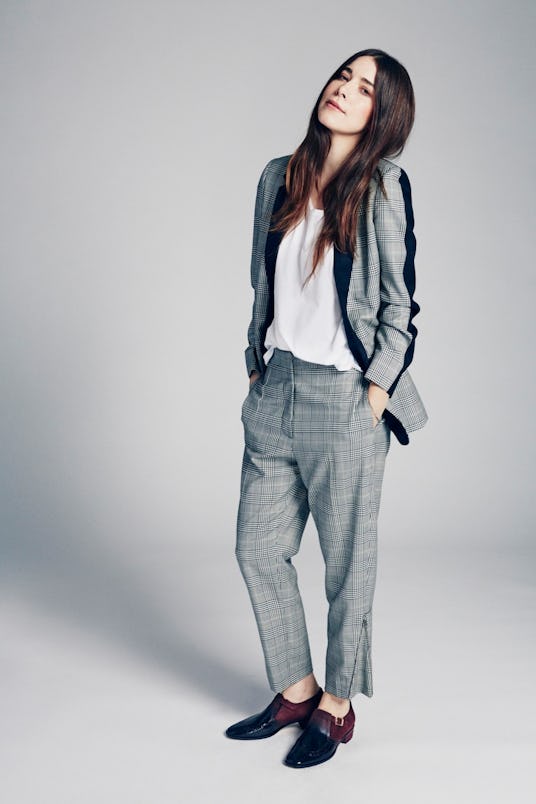 Danielle Haim in a grey suit 