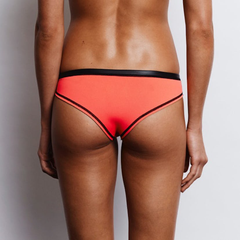 Brazilian bikini bottoms, N.L.P. Cheeky Cut Bottom, simple, peach colored bottoms with black stripes...