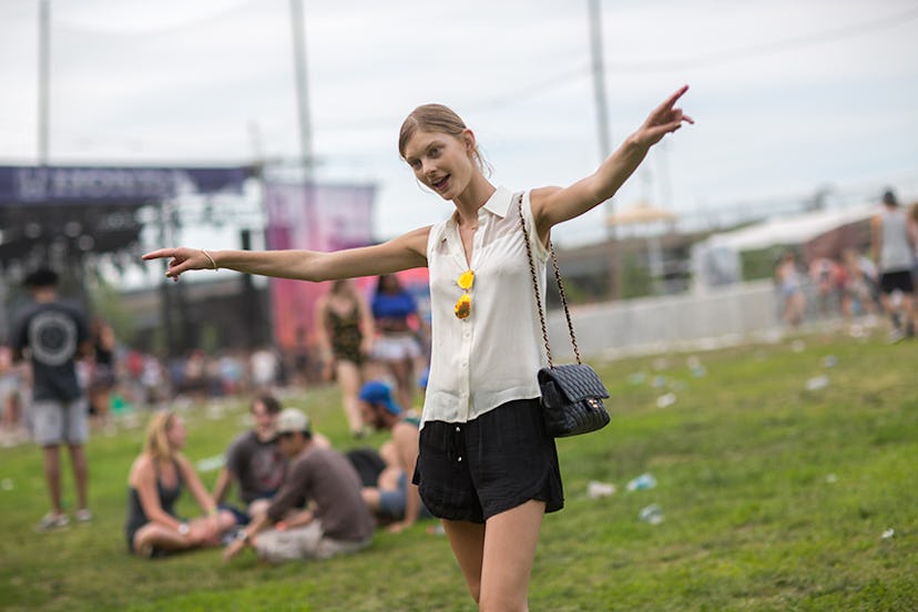 Patricia van der Vliet in a white collared tank and black shorts at Governors Ball 