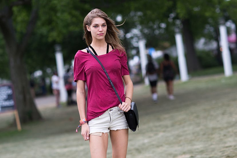 Samantha Gradoville in a pink top and light denim shorts with a black cross-over bag at Governors Ba...