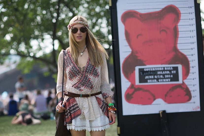 Zuzanna Buchwald in a crochet top and white lace skirt at Governors Ball