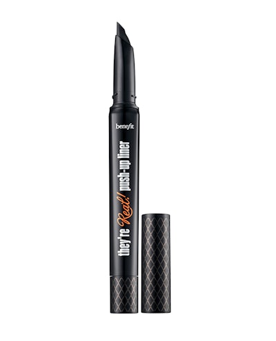 A black tube of the black Benefit push-up liner next to it's lid