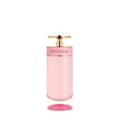 A pink, tall bottle of "Candy Florale" by Prada, a sweet perfume with scent of a cosmos flower
